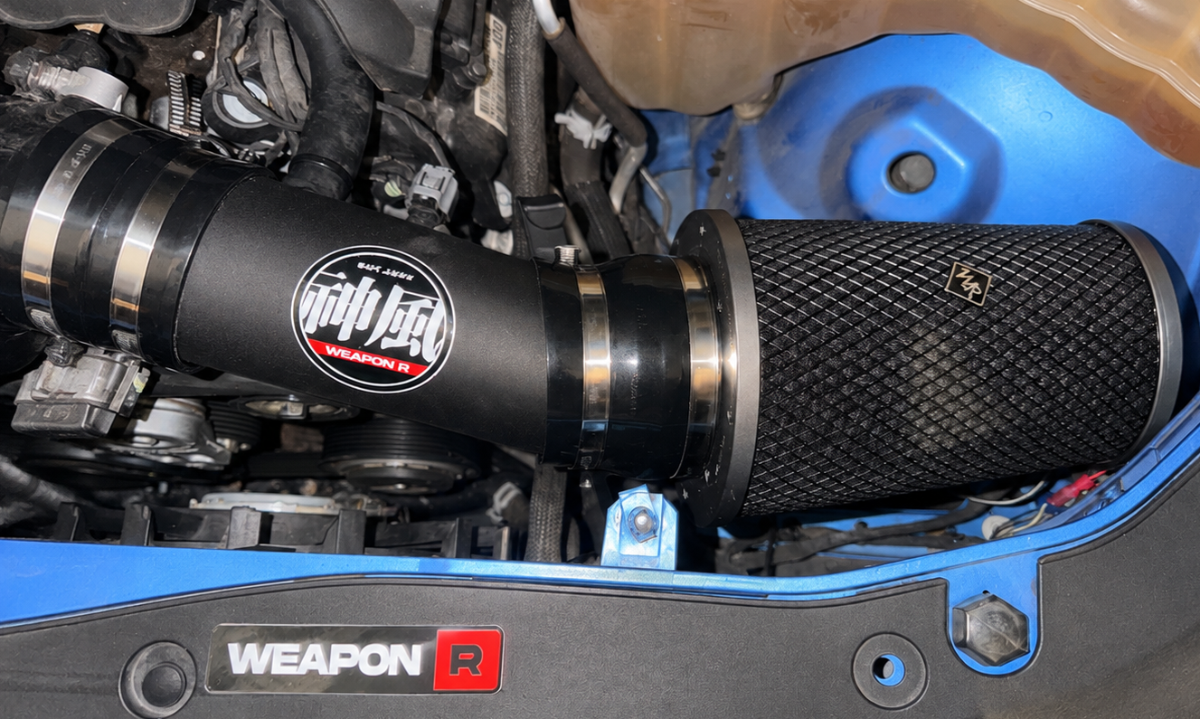 Weapon R cold air intake installed in a blue engine bay